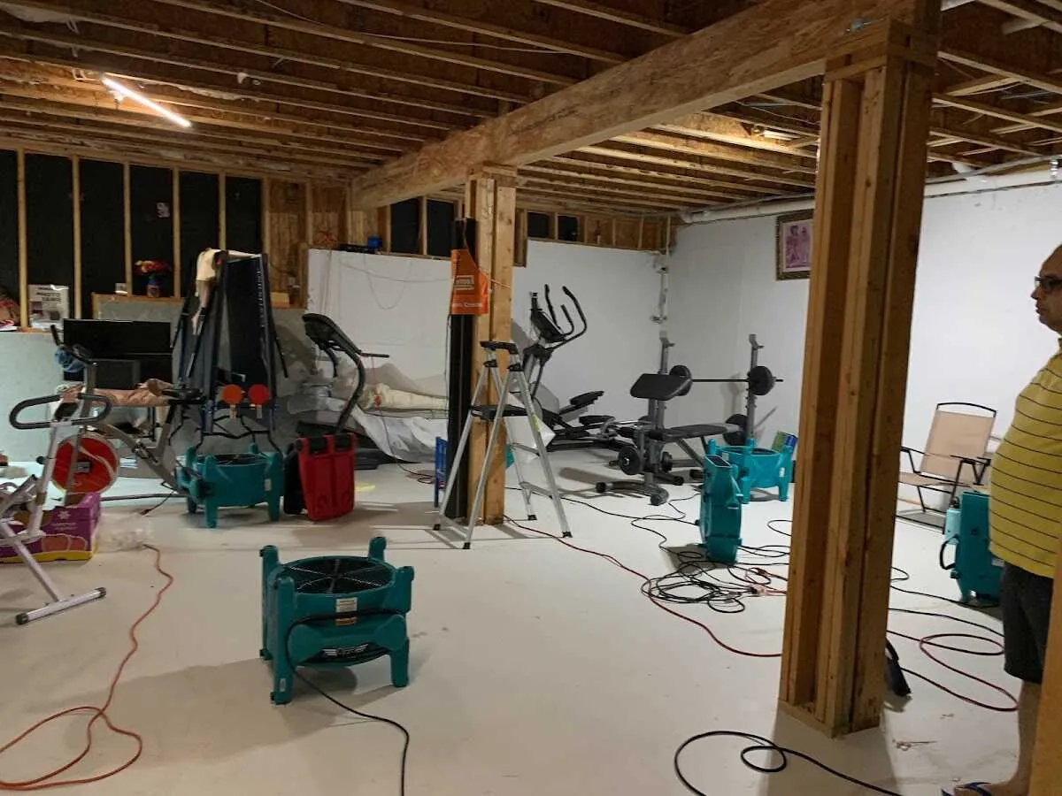 Basement drying equipment setup for Odor Removal & Deodorization in Elk River